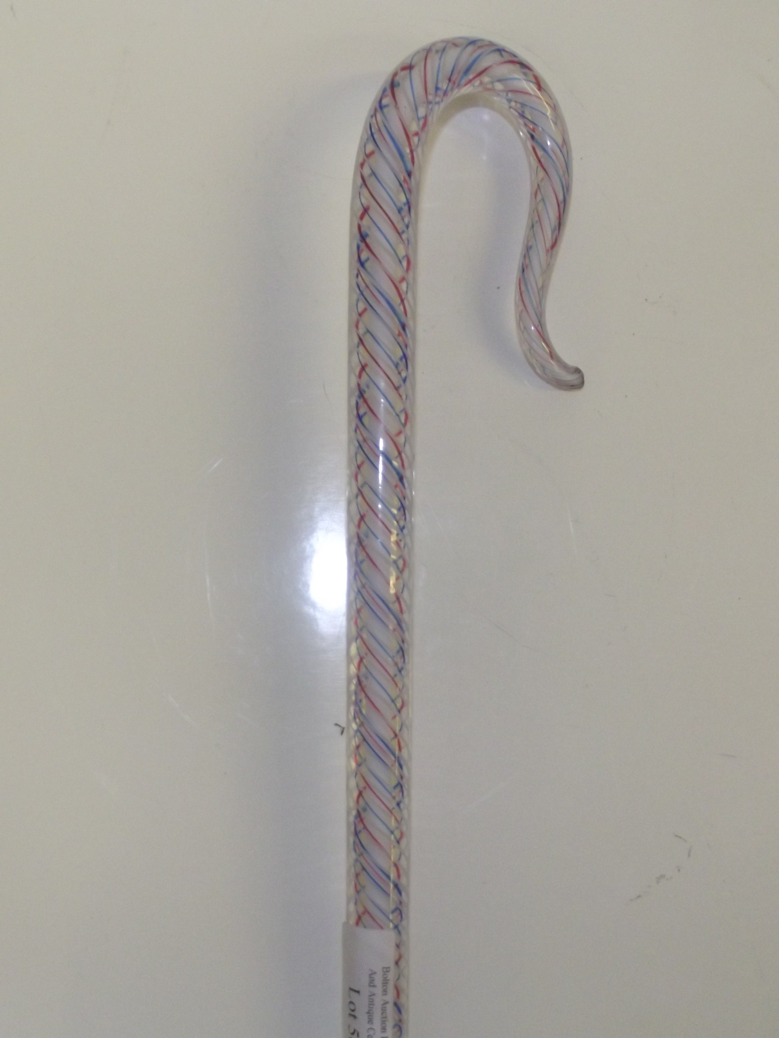 Victorian glass walking stick with red, white and blue twists, minor damage to both ends, 122 cm