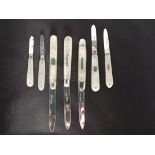 Collection of seven early 20th century fruit knives with mother of pearl handles. Various assay