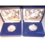 Two boxed £5 silver proof crowns with COA Total weight 56.56 grams