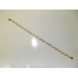 14 carat gold bracelet set with 19 opals, 19cm