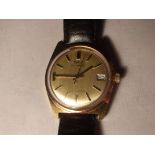 A vintage SAGA automatic wristwatch with leather strap