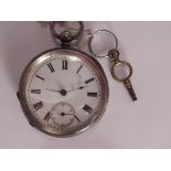 A late 1900th century 935 silver pocket watch with key.