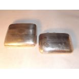 Two silver cigarette cases. Total weight 155 grams