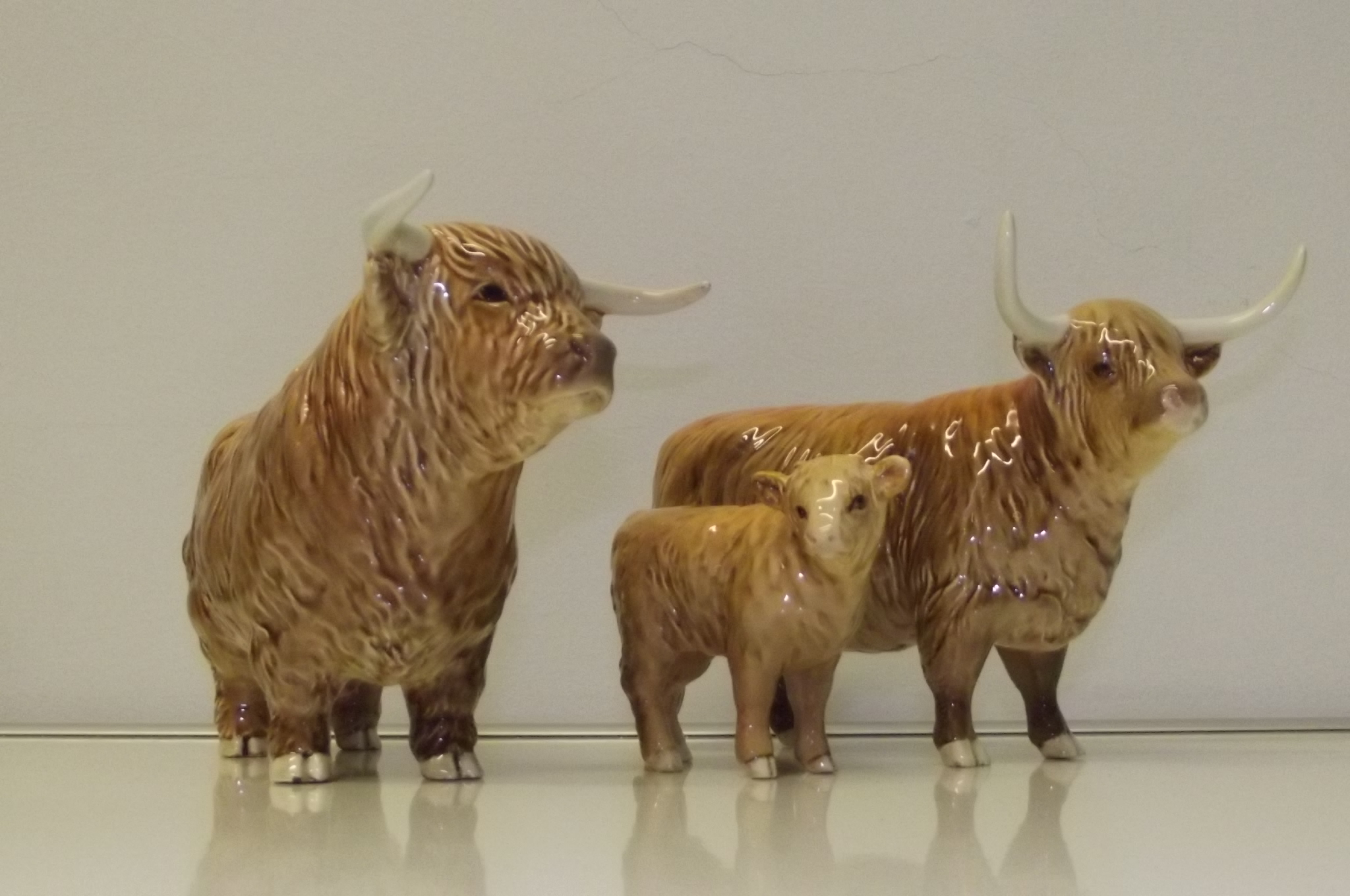 Beswick Highland trio comprising - Highland Bull, cow and calf. Height of Bull 13cm - Image 2 of 2