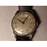 A vintage Cimier wristwatch. Age ware to the stainless steel case.