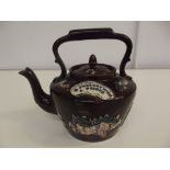 Measham ware teapot with sprig floral decoration 'A PRESENT FROM A FRIEND', repair to handle, 21cm