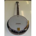 A Godman Banjo, with soft case. Very good condition.