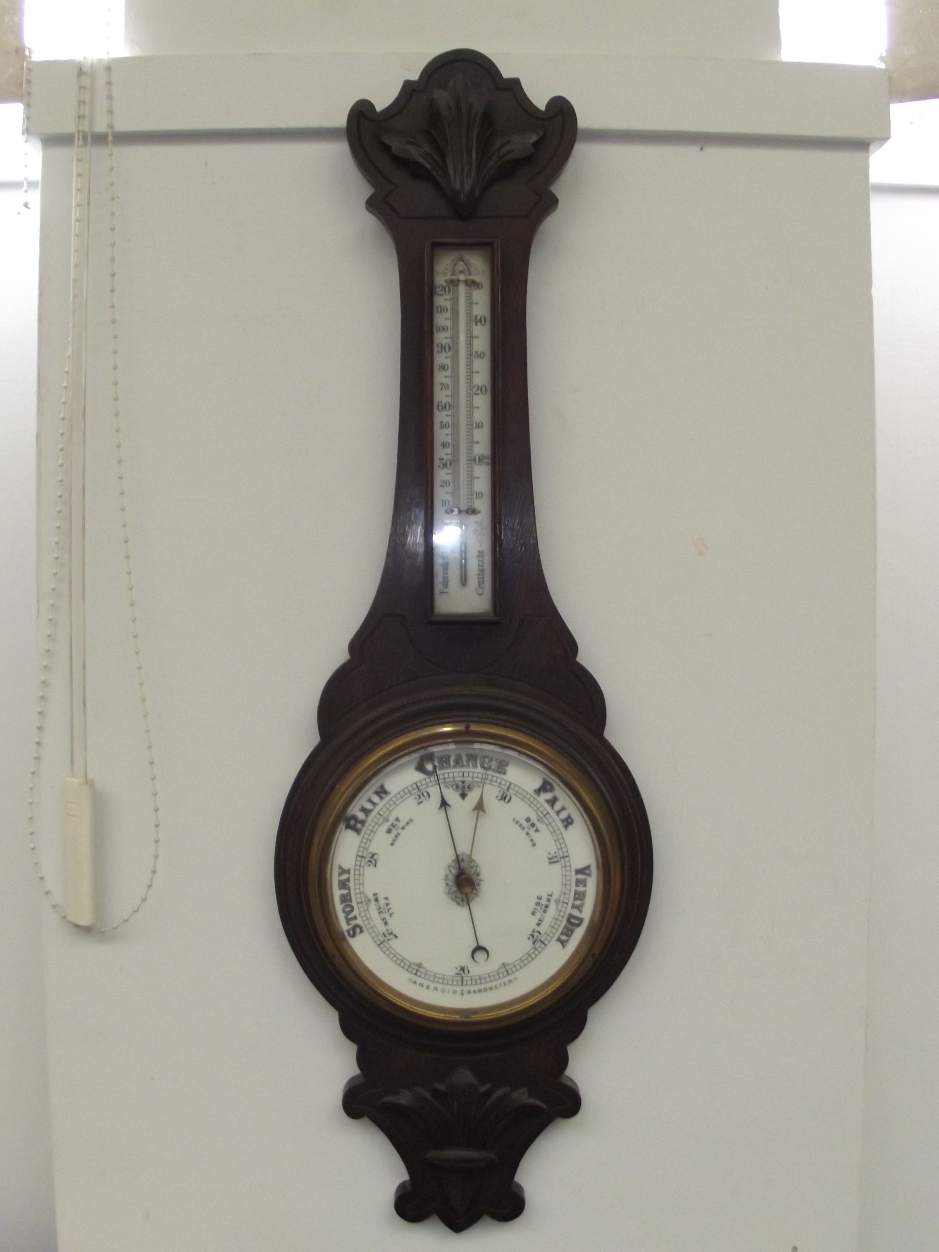 A banjo barometer 35 inches long