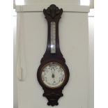 A banjo barometer 35 inches long