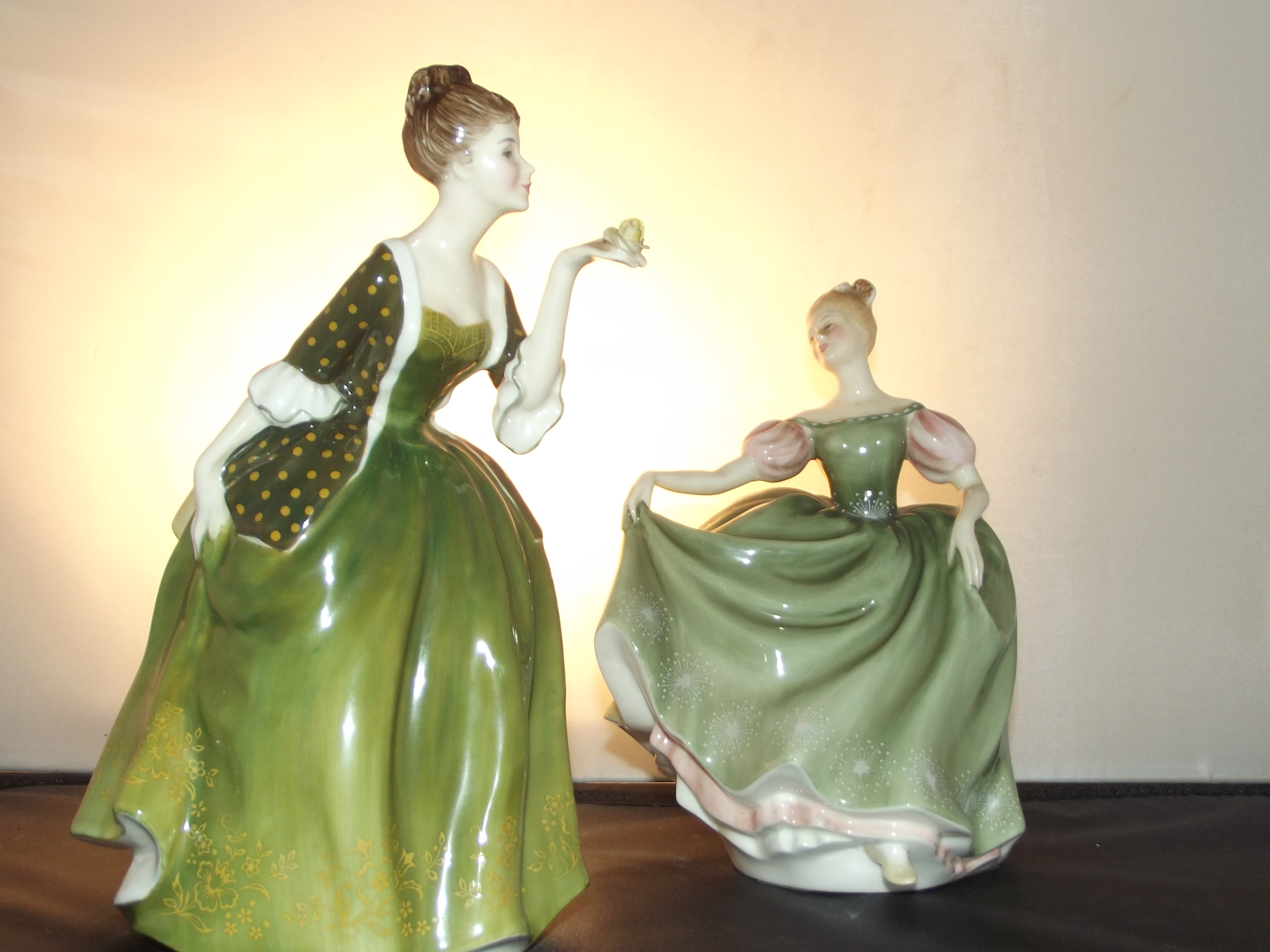 Royal Doulton "Michele" HN 2234 and Royal Doulton "Fleur" HN 2368. Tallest 8 inches.