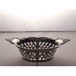 A pierced sterling silver navette dish. 20 grams