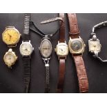 Seven vintage ladies wristwatches. A vintage Genex Prima (Rolex) with silver case. A Roclever 9ct