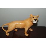 A Beswick lioness, 14 cm in height.