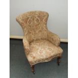 Victorian spoon back ladies chair on walnut cabriole legs to a serpentine front, upholstered in
