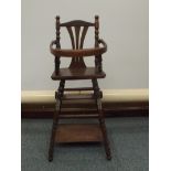 Victorian dolls converting high-low chair, turned legs and spindles, iron wheels, original