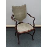 Edwardian drawing room open armchair, shield back, open arms and crinoline stretcher, width 52cm,