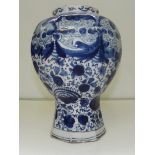 18th century blue and white Delft vase of octagonal form, monogram to base, decorated with peacocks,