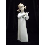 Lladro figure of a young girl in original box 20cm