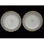 Pair of Red line star dessert plates enameled in the Wisteria pattern 6/1910 (nibbles to rim of