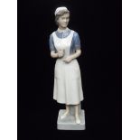 Royal Copenhagen nurse figure , numbered 4507 , impressed JMN mark to rear for JM Nissen , height