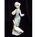 Lladro figure of a lady with a goose with original box 23cm