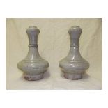 Pair of Sung period garlic neck vases in green celadon, height 21cm