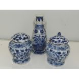 Three pieces of Chinese blue and white pottery, pair of small temple jars (a/f) four character