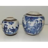 Two Oriental ginger jars (no lids), strong blue and white with bronze coloured inlays, garden scenes