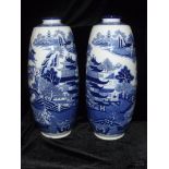 A pair of Mintons blue and white oriental pattern vases. 32cm high