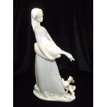 Lladro figure of a lady holding a goose 27cm