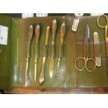 A cased silver manicure set