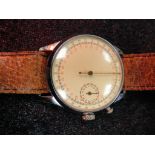 A vintage wrist-worn stopwatch with subs