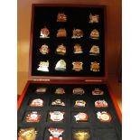 A boxed set of 30 Arsenal stick pins in