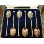 A cased set of HM silver coffee spoons