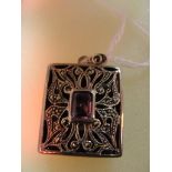 A HM silver and amethyst set locket/pend