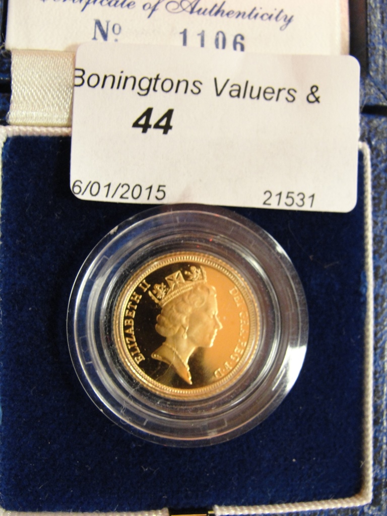 A boxed Royal Mint 1990 gold proof half