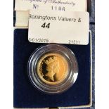 A boxed Royal Mint 1990 gold proof half