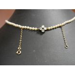 A Victorian pearl necklace with gold and