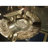 An Indian silver ashtray carved with ele