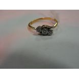 An 18ct diamond trilogy ring