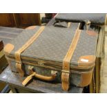 A Luis Vuitton vintage suitcase with Ecl