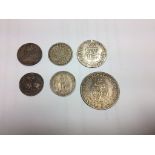 Six 18th century silver tokens