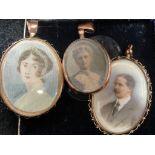 Three 9ct pendants and portraits