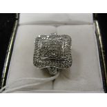 A 9ct white gold diamond dress ring with 0.75ct total diamond weight