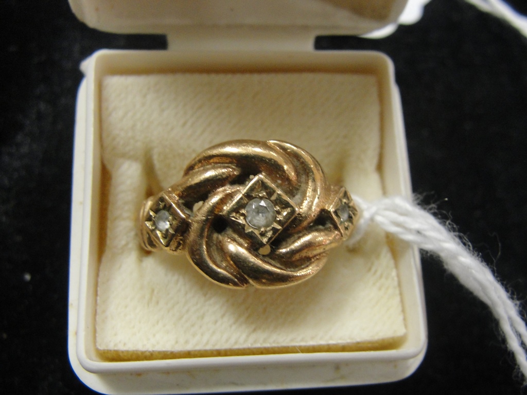 A 9 ct Turkish Knot ring set with Spinels