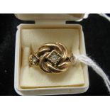 A 9 ct Turkish Knot ring set with Spinels