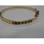 A gold-plated silver 'Dearest' stone set bangle