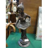 A bronze ballerina figure