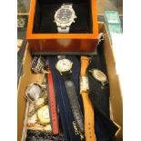 A box of vintage gentlemens and ladies wristwatches