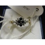 A 9ct CZ and sapphire dress ring